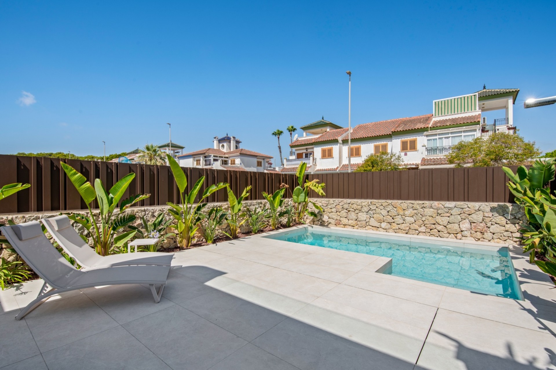 Nueva construcción  - Villa -
Mil Palmeras